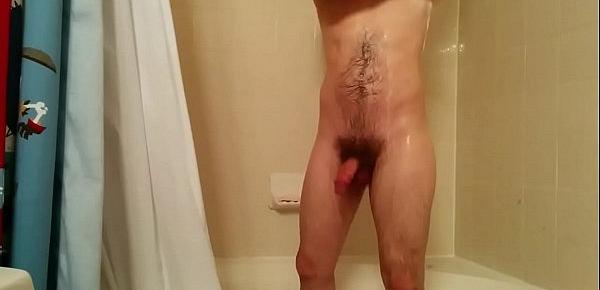  hung guy taking a shower